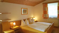 Schlafzimmer in der Ferienwohnung in Flachau